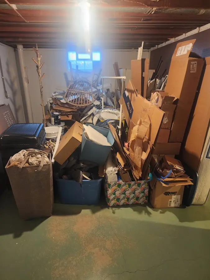 Roll-off dumpster container at job site for 6 Yard Dumpster Rental in Indian Hills